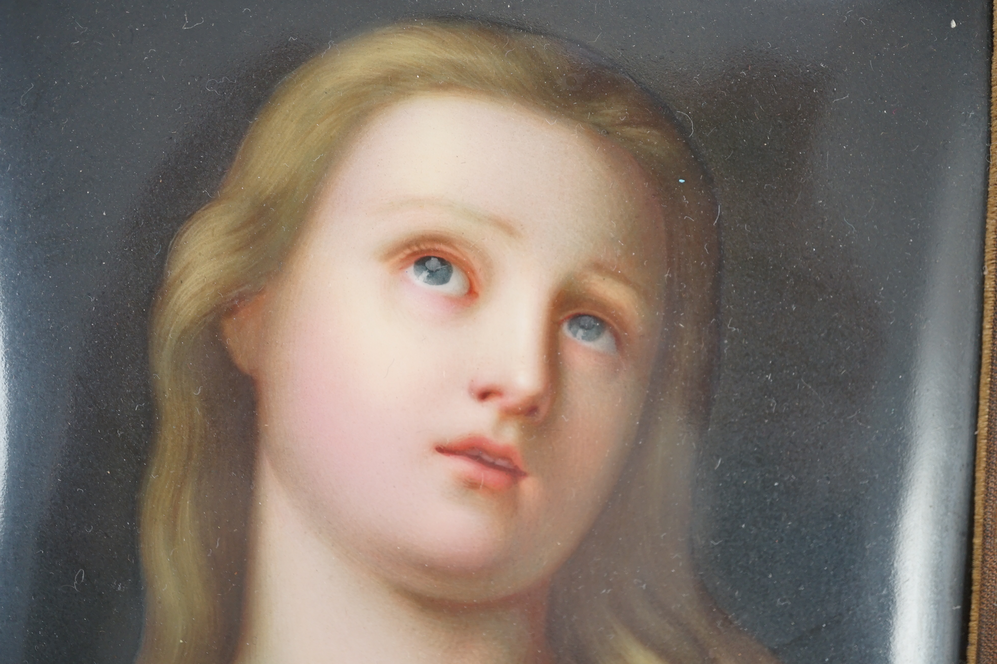 A KPM Berlin porcelain plaque of the Penitent Magdalene, after Pietro Rotari, late 19th century